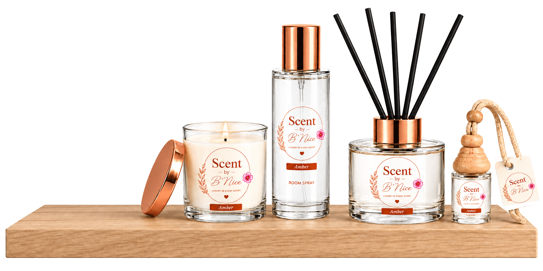 Scent by B'Nice candle, room spray, room diffuser and car diffuser arranged together on a pale oak shelf